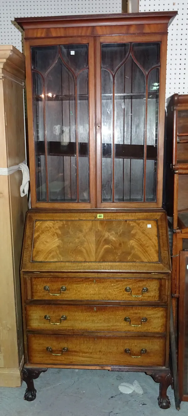 A 20th century mahogany bureau bookcase, on ball and claw feet, 79cm wide x 200cm high.   M6