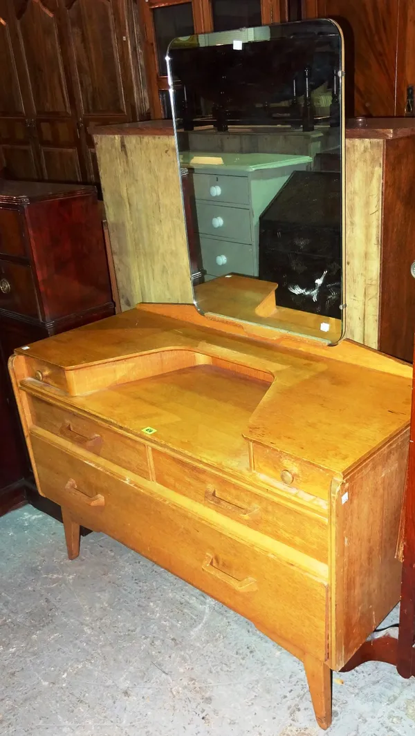 A mid-20th century beech dressing table, with two short and two long drawers, 108cm wide x 100cm high.    K7