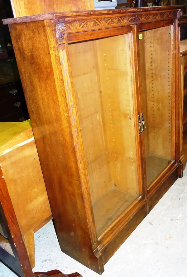 A 19th century oak two door display cabinet 106cm wide x 122cm high.  K8