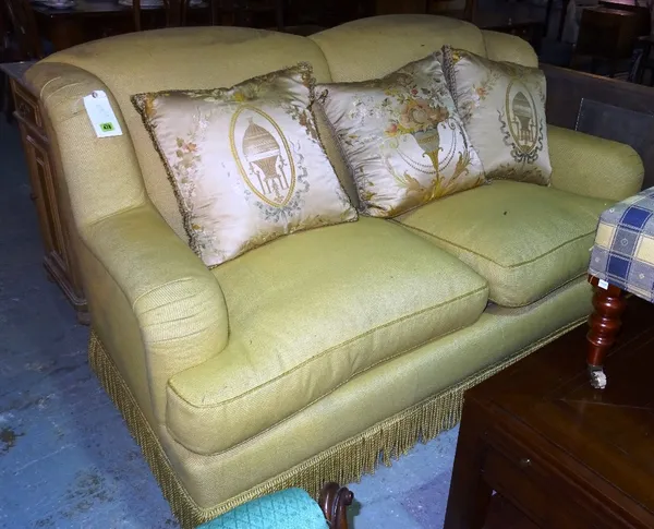 A 20th century yellow upholstered two seat sofa, 175cm wide. E8