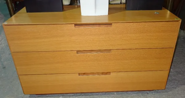 A 20th century oak three drawer chest 121cm wide.  H8
