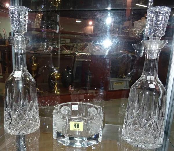 A pair of Waterford cut crystal decanters and stoppers, with etched mark to base, 33cm high, and a Rosenthal 'Versace' octagonal glass bowl, 16cm wide