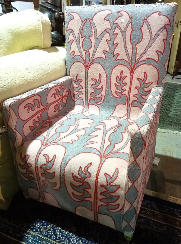 A 20th century silver and pink beadwork upholstered cane armchair. J5