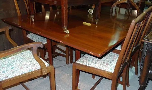 A 20th century mahogany rectangular drop-flap dining table on reeded square supports, 180cm x 125cm.   I10