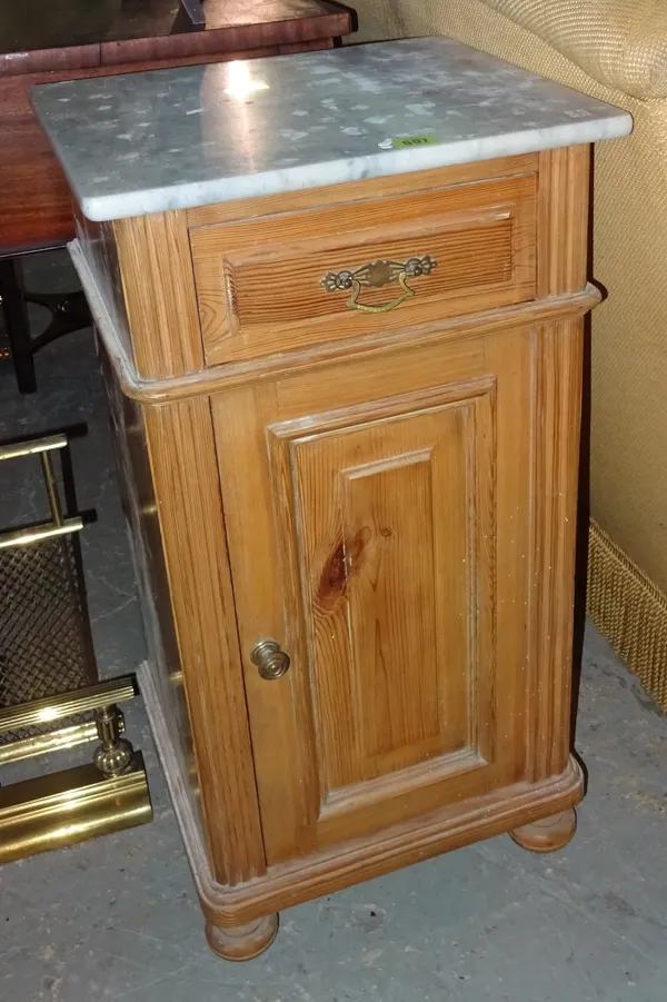 An early 20th century French pine pot cupboard, with white marble top, 42cm wide x 80cm high.  F8