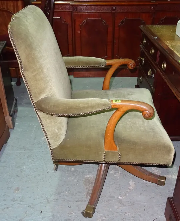 An early 20th century walnut desk chair.  D10
