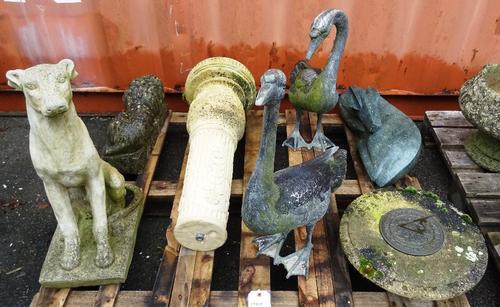 Garden statuary, including; mostly 20th century, reconstituted stone ornaments including a sundial, a greyhound, a lion, a gazelle and a fibreglass ge