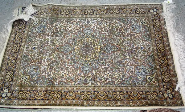 A modern rug of central Persian design, 123cm x 185cm with a modern Indian green bokhara rug, 125cm x 190cm, (2)   J6
