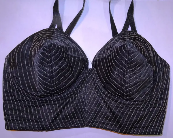 Entertainment interest; two black and white pin striped bustier's, reputedly from the Madonna Blonde Ambition Tour, (2)  CAB