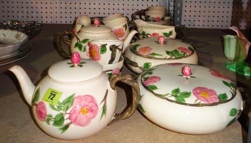 A large part dinner service by Franciscan, decorated with pink flowers, (qty). S4