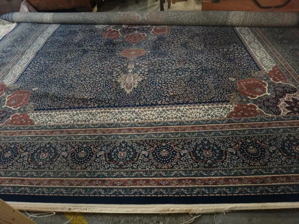 A machine made carpet, 504cm x 400cm.   H4
