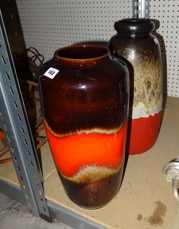 A large German brown glaze studio pottery vase and another similar red glazed vase, (2).   S4B