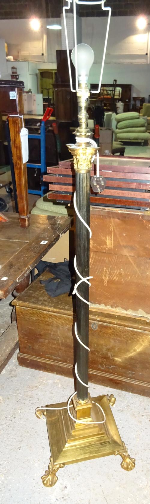 An early 20th century brass and faux bronze standard lamp.  J6