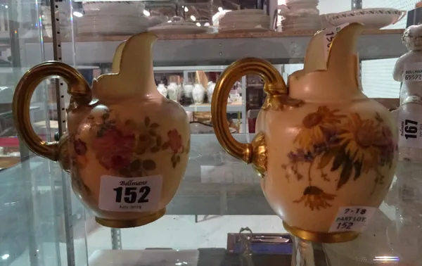 A small pair of Royal Worcester blush ivory vases of ewer form with painted floral decoration, (2).   CAB