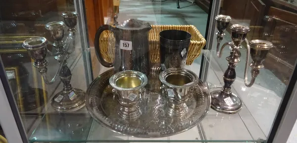 Silver plated wares, including; a circular salver, a pair of table candelabra, a pair of urn shaped salts and a quantity of flatware, (qty).   CAB