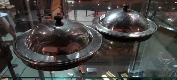 A pair of 20th century Keswick School of Art beaten steel lidded bowls, (2).   CAB