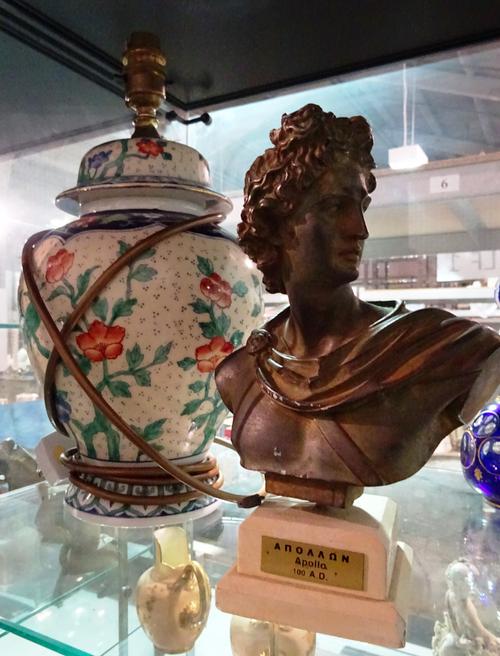 A small 20th century faux bronze bust of Apollo and a 20th century Chinese lamp base, 24cm wide.   CAB