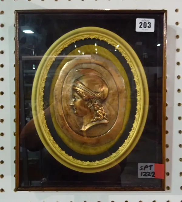 Lutiger, a 20th century oval copper portrait plaque depicting a Roman profile portrait, framed, overall size, 31cm x 26cm.  ROST
