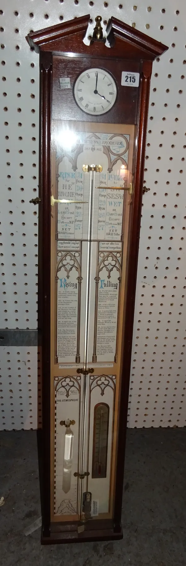 A 20th century Admiral Fitzroy barometer with integral clock, 105cm high.  CAB