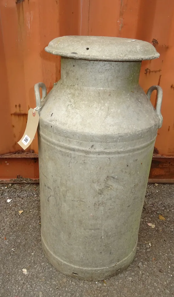 Swiftcan; a 20th century aluminium milk churn, 68cm high x 35cm wide.   OUT