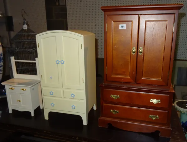 Toys, comprising; a group of large scale doll's house furniture, including a mahogany wardrobe, 65cm high x 39cm wide, a white painted wardrobe and a