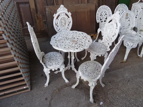 Garden furniture, comprising; a 20th century white painted metal table and a set of four chairs, (5).  OUT