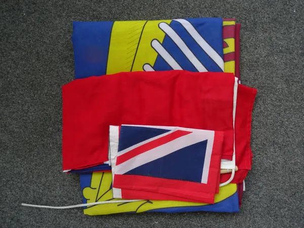 A quantity of international flags, 20th century, varying sizes, including; St George flag (107cm x 74cm), a larger St George flag (360cm x 180cm), a m