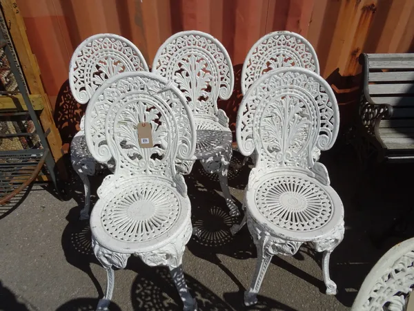 Garden furniture, comprising; a set of five 20th century white painted cast iron chairs, (5).   OUT