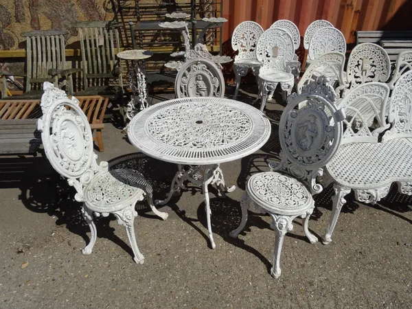 Garden furniture, comprising; a 20th century white painted metal circular table and three chairs, (4).  OUT