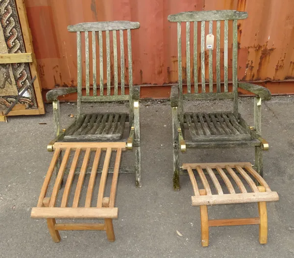 A pair of 20th century hardwood steamer chairs, (2).   OUT
