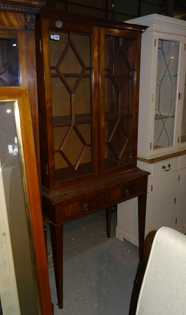 A George III style two door display cabinet on twin drawer base with tapering square supports, 84cm wide x 182cm high.  M8