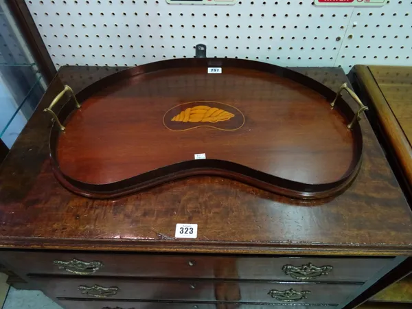 An Edwardian kidney shaped mahogany tray with galleried top with brass handles, 56cm wide.   A8