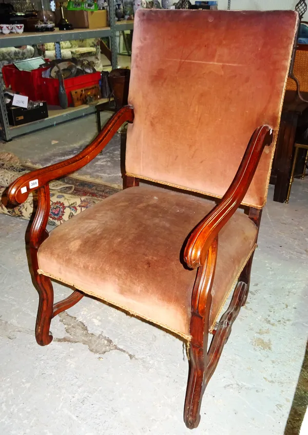 A Louis XIV style oak open armchair.  D4