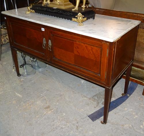 An Edwardian mahogany side cupboard with marble top on square tapering supports, 120cm wide x 80cm high. E4