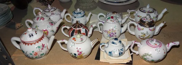 Ceramics, including; twelve reproduction 'Victoria & Albert Museum' teapots with certificates, (12).  S3M