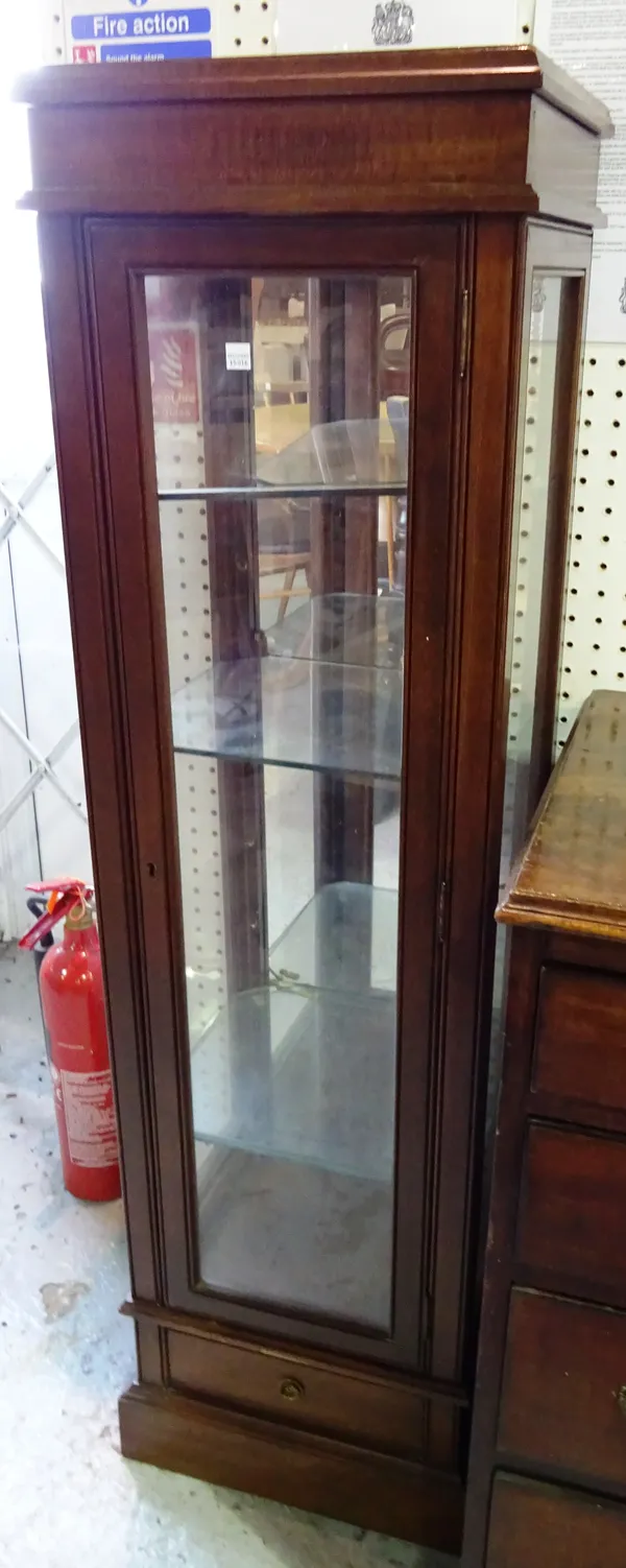 A 20th century mahogany four tier display cabinet with single drawer to base, 37cm wide x 143cm high.  A8