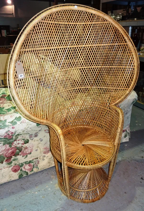 A 20th century wicker "Peacock" chair.   BAY 2