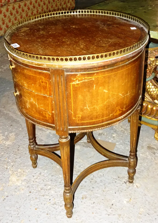 A 20th century mahogany inlaid circular drum table with galleried top, 46cm wide. G4