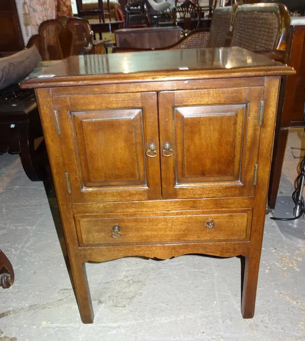 A pair of 20th century mahogany bedside tables each with pair of cupboards and single drawer, 55cm wide, (2).  D4