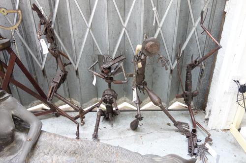Goncalo Mubunda (Mozambican, born 1975), Untitled, four reclining figures, soldered steel and related metal scrap, the largest figure 140cm, (4).  OUT