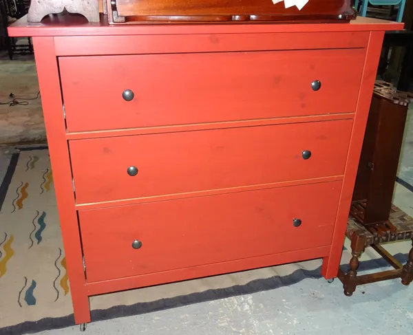 A pair of 20th century IKEA red painted chests with three drawers, 110cm wide, (2).  I8