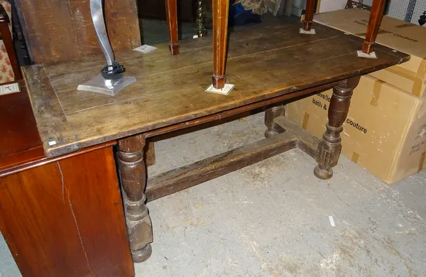 A 17th century and later oak refectory table on baluster supports united by 'H' frame stretcher, 76cm wide x 196cm long x 79cm high.   BAY 3