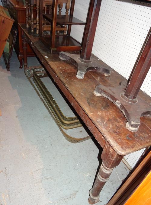 An early 20th century stained pine and mahogany serving table, 241cm wide x 59cm deep x 75cm high.  J10