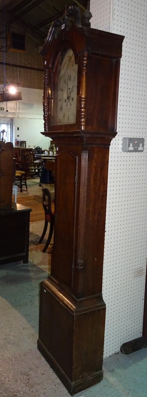 Jno Hargreave, Sleaford; An early 19th century oak and mahogany 8 day longcase clock, with arched painted dial supporting twin train movement striking