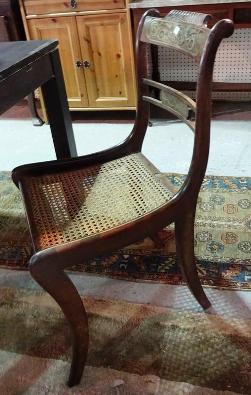 A set of four Regency rosewood and brass inlaid bar back dining chairs, (4)  E9