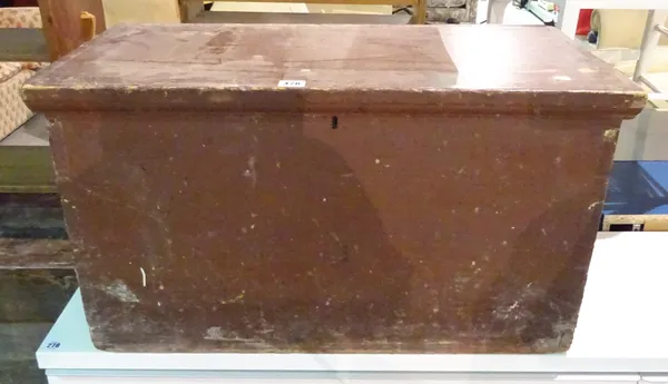 An early 20th century brown painted lift top trunk, 75cm wide x 41cm high.  J5