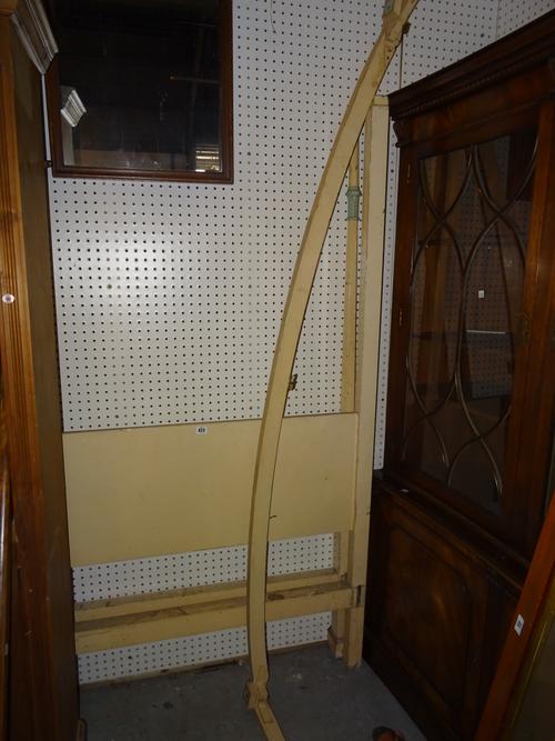 An early 20th century Regency style white painted single four poster bed with a canopy top, 107cm wide x 195cm high.   EXTRA