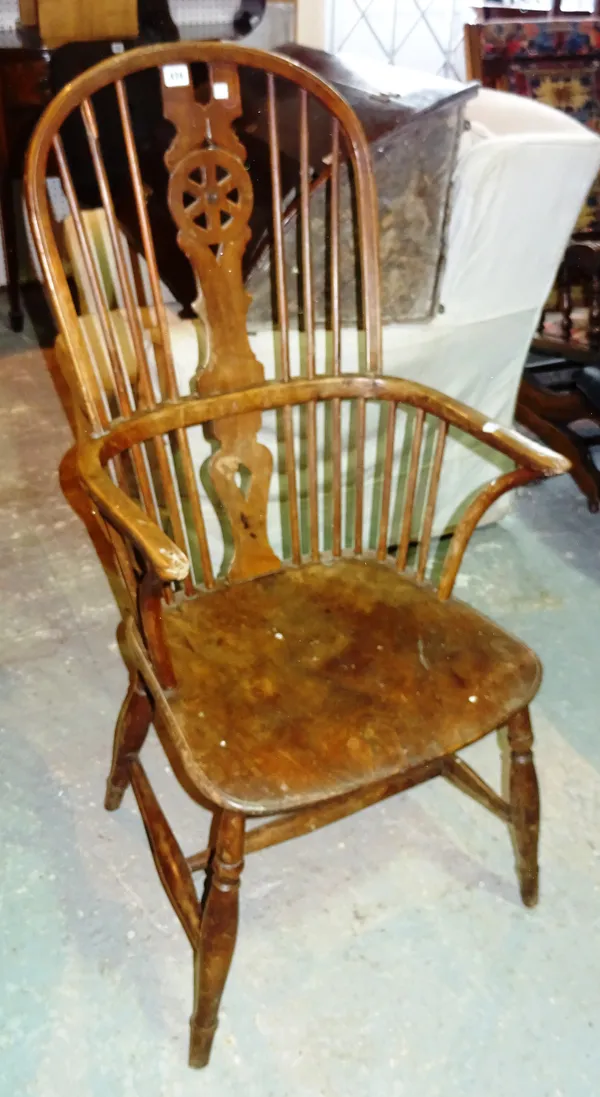 A 19th century ash and elm Windsor open armchair.  J6