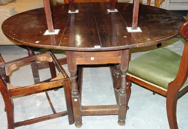 An 18th century oak gateleg table, 118cm wide x 75cm high.  J8