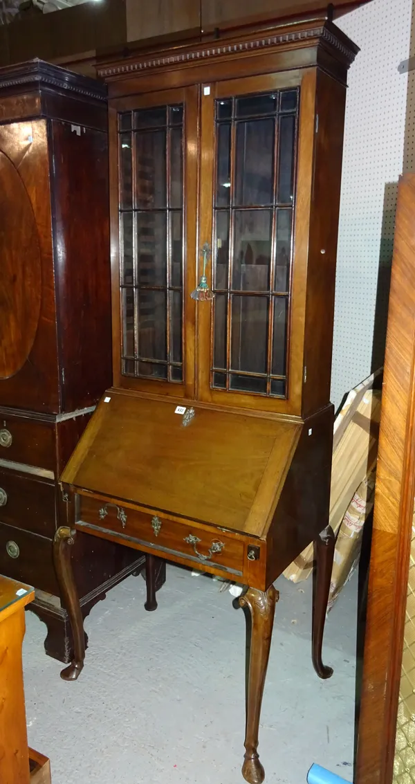 A 19th century mahogany bureau display cabinet, on tapering hoof supports. M5